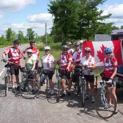 Cyclists dressed in Canada Day clothes
